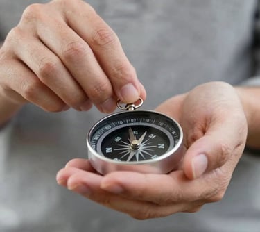 A close-up shot of hands carefully handling a compass or a set of keys, representing stewardship and responsibility. Soft, natural lighting highlights the textures of #A2B2AE and #1A1A1A.