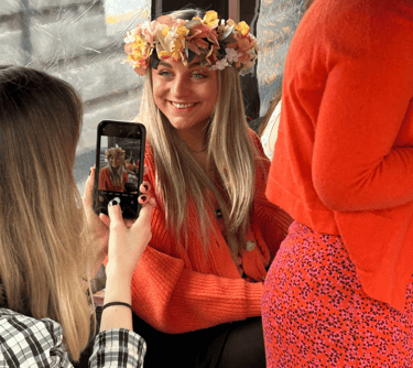 woman showing off her handmade flower crown