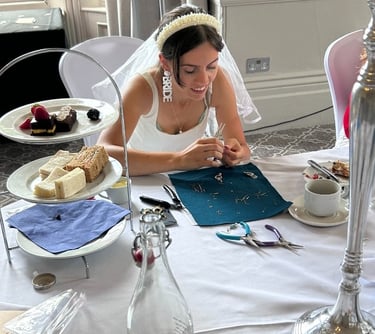 bride making earrings at a jewellery making hen party