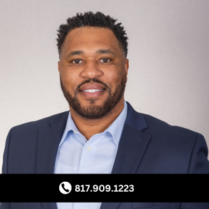a man in a suit and tie smiling