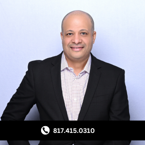 a man in a suit and tie smiling