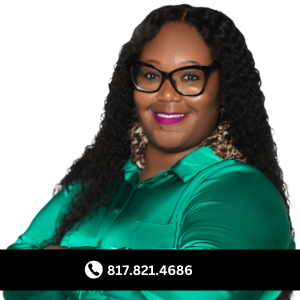a woman in a green shirt and glasses
