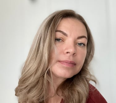 a woman with blonde hair and a red dress