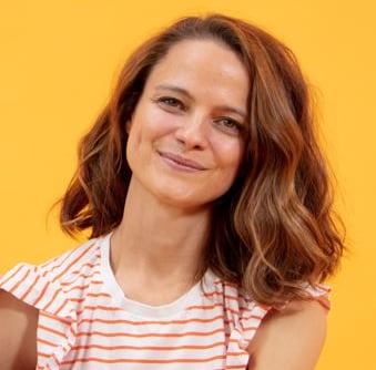 a woman with a guitar and a guitar