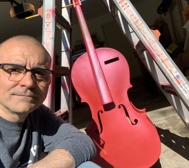 Ed Lead Penguin with Red Cello