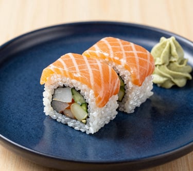 woman in black blazer with brown hair