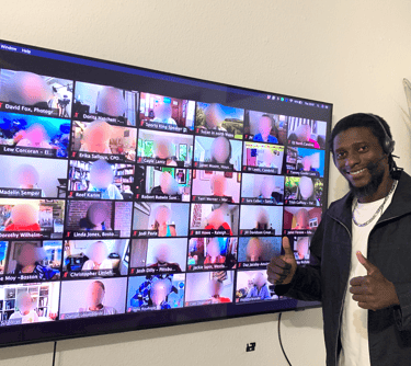 Glody kikonga in a coaching session with clients from all over the world