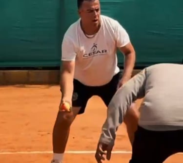 Coach Cesar working with Tennis Infinity Coaches