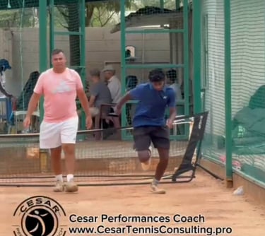 Coach Cesar working with ITF player