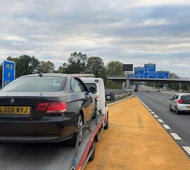 a tow truck with a tow truck on it
