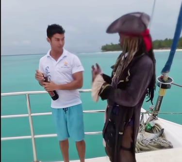 a man in a pirate costume on a boat punta cana