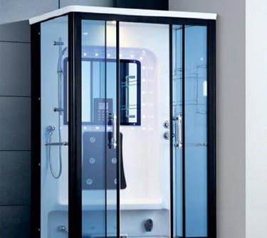 a modern shower room with a glass shower
