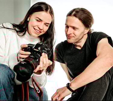 Photographer engaging with a client in a professional studio setting