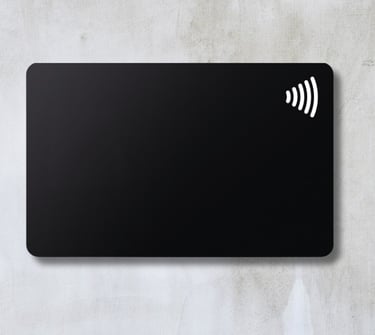 a black NFC pvc card with a wireless Logo on top made in paranaque