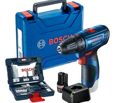 a man in a blue shirt and glasses is using a drillet