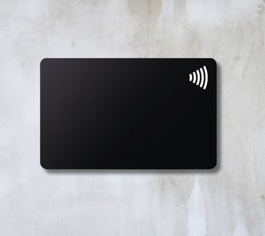 a black NFC pvc card with a wireless Logo on top made in paranaque