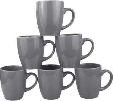 Set of six grey ceramic coffee mugs stacked in a pyramid on a white background.