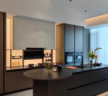 A dark modern kitchen solution with strong contrast and sleek lines