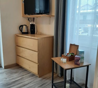 a small table with a small table and a television