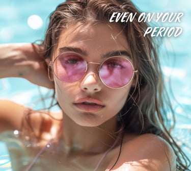 woman in pink shades in a pool