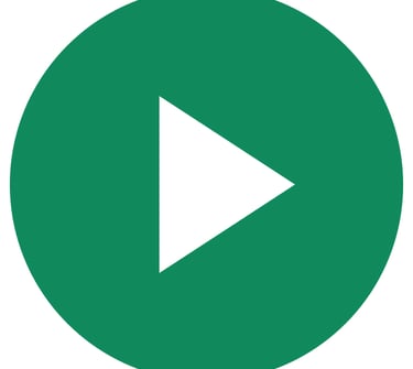 a green play button with a white arrow pointing to the left