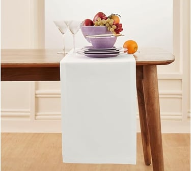 Simple white table runner for minimalist dining room table styling