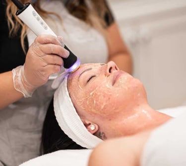 Woman receiving oxygeneo facial treatment in Vadodara for skin rejuvenation, glow facial, by best dermatologist