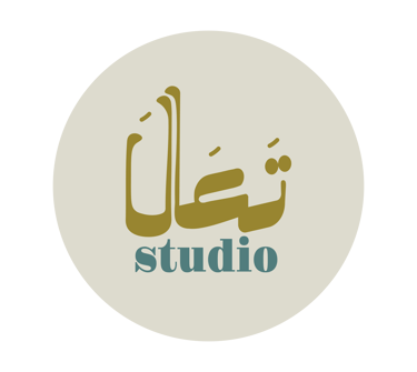 Ta'ala Studio logo featuring gold Arabic calligraphy and teal typography on a cream circle.