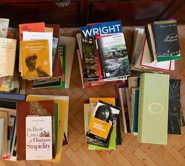 Architecture and anthropology books used as references by ma+su, photographed from above in Rabat