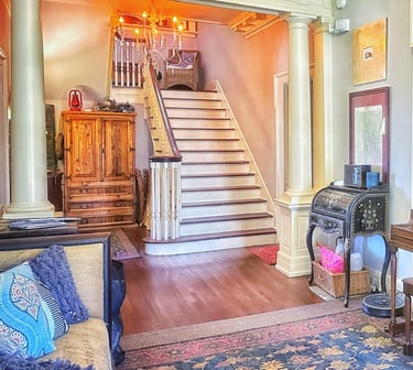foyer and grand staircase 2123 rivermont apartments