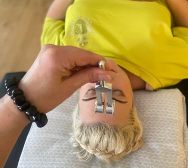a woman during saound therapy session