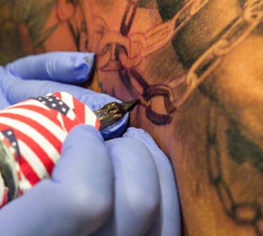 Tattoo session in Miami showing a client getting a design