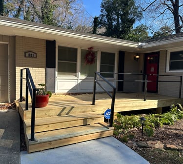 a house with a outdoor metal railing