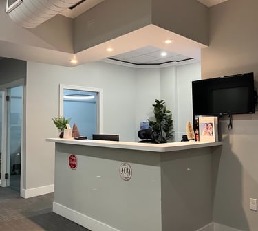 The receptionist area inside a dental office.