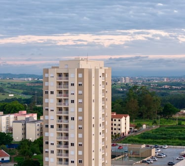 a tall building with a clock tower in the middle of it