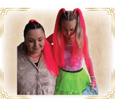 2 women with cornrows that go into pony tails