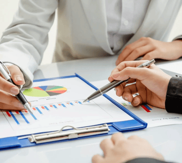 a doctor showing a chart to a patient