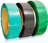Green PET strapping coils stacked for export shipment