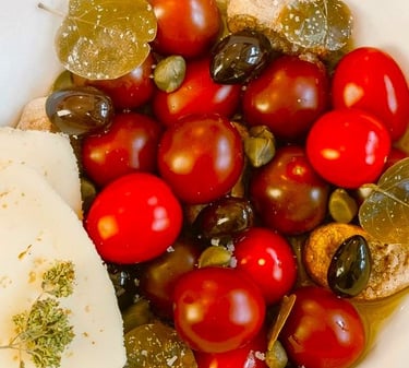 Cherry tomato salad with olives & Naxian cheese prepared by villa eats private chefs Naxos