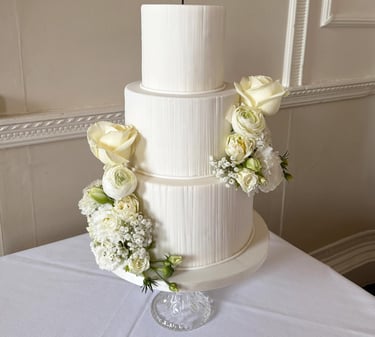 Iced 3 Tier Wedding Cake with Fresh Flowers By Sweetcupcakes Cakery