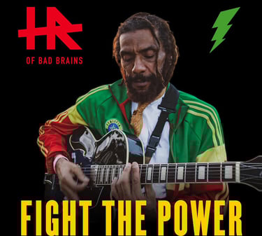 Dub Reggae band member HR of Bad Brains playing guitar at an event booked by J Phoenix Booking Agent