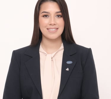 headshot of Betania Locatti Macereno in a black blazer