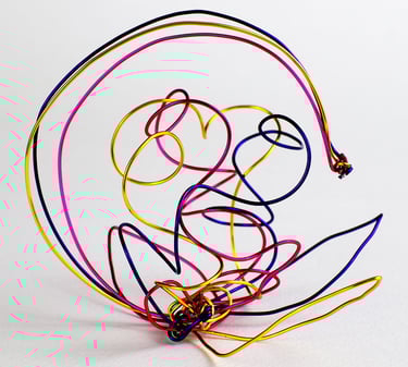 Abstract metal wire sculpture suggesting a half moon