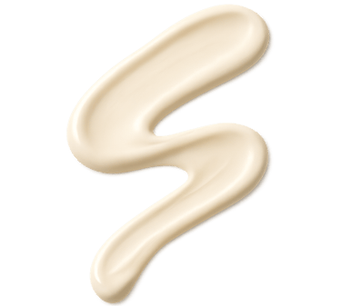 Beige sunscreen lotion swatch on a white background