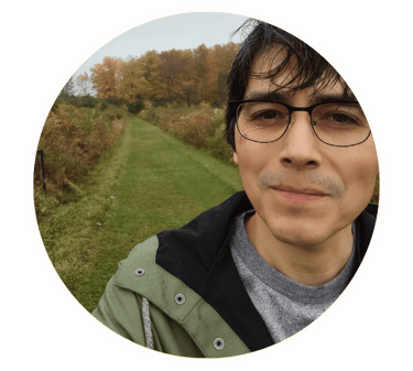 A color photo of the playwright and writer Ruben Carbajal at Lansing Center Trail in Lansing, NY.