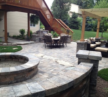Leppek Landscapes designed patio, gazebo, water feature, fire pit and walkways. 