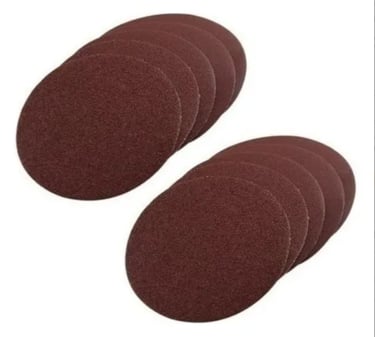 A stack of brown orbital sanding discs for wood and metal surface preparation.