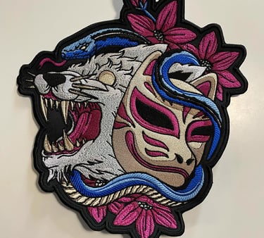 a patchwork embroidered on a white background