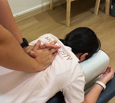 Chiropractic spinal adjustment therapy for back pain at Sinisana Chiropractic