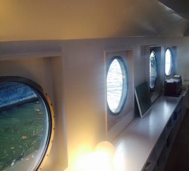 Portholes in a Dutch barge living room